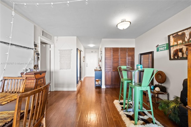 1470 NE 125th Ter Unit Ph9, North Miami, FL 33161 - hall with wood-type flooring and baseboards