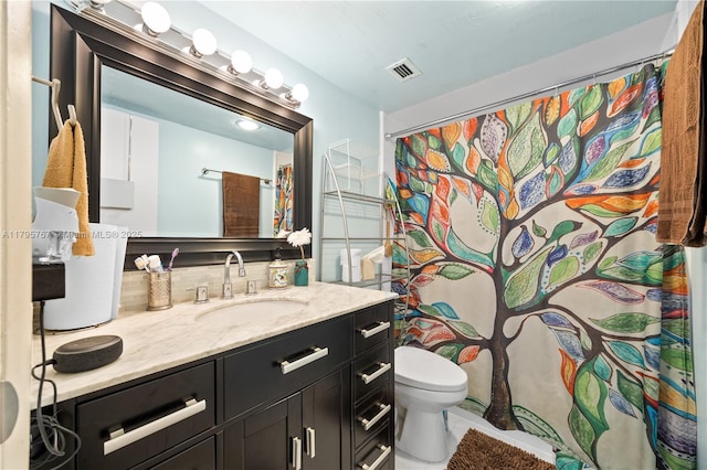 1470 NE 125th Ter Unit Ph9, North Miami, FL 33161 - bathroom with vanity, toilet, and a shower with curtain