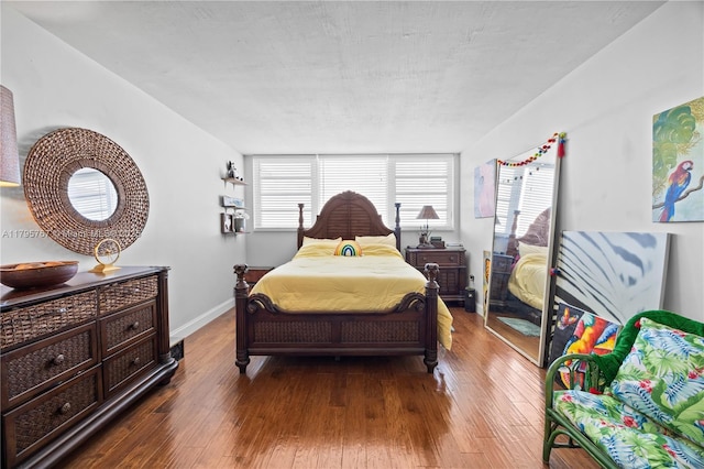 1470 NE 125th Ter Unit Ph9, North Miami, FL 33161 - bedroom featuring hardwood / wood-style floors and baseboards