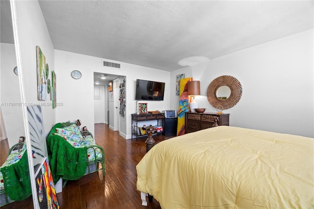 1470 NE 125th Ter Unit Ph9, North Miami, FL 33161 - bedroom featuring wood finished floors and baseboards
