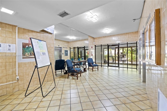 1470 NE 125th Ter Unit Ph9, North Miami, FL 33161 - community lobby featuring tile walls