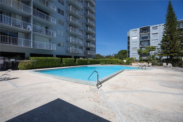 1470 NE 125th Ter Unit Ph9, North Miami, FL 33161 - community pool with a patio