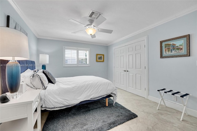121 Tacoma Ln, Palm Beach Shores, FL 33404 - bedroom with crown molding, ceiling fan, a closet, and baseboards