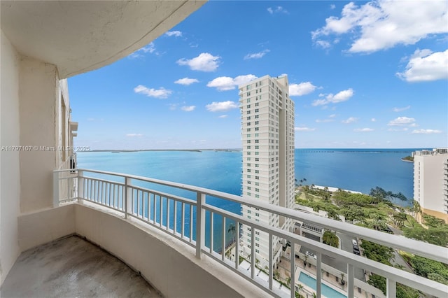 balcony featuring a water view