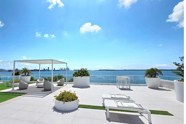 view of patio / terrace with a water view