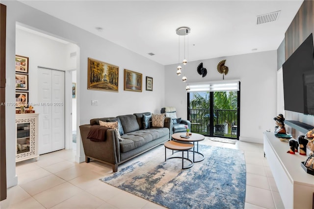 8301 NW 41st St Unit B-305, Doral, FL 33166 - living room featuring light tile patterned flooring