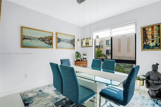 8301 NW 41st St Unit B-305, Doral, FL 33166 - dining space with baseboards