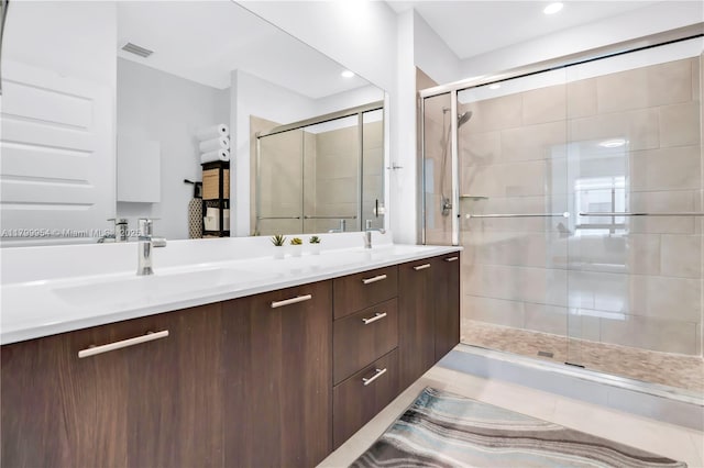 8301 NW 41st St Unit B-305, Doral, FL 33166 - full bath featuring a stall shower, double vanity, and recessed lighting