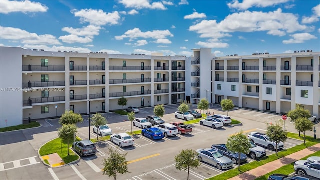 8301 NW 41st St Unit B-305, Doral, FL 33166 - view of apartment building / complex with uncovered parking