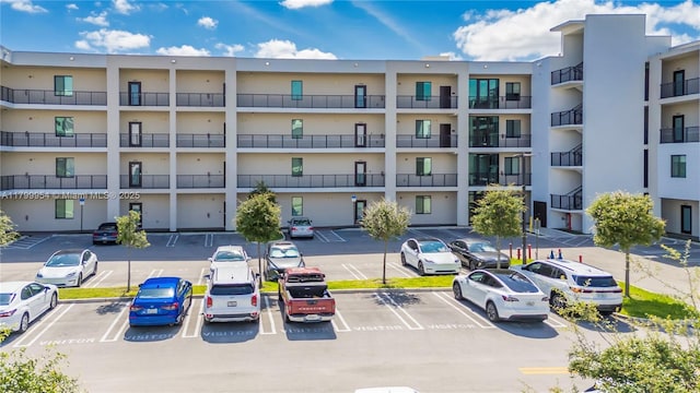 8301 NW 41st St Unit B-305, Doral, FL 33166 - view of apartment building / complex with uncovered parking