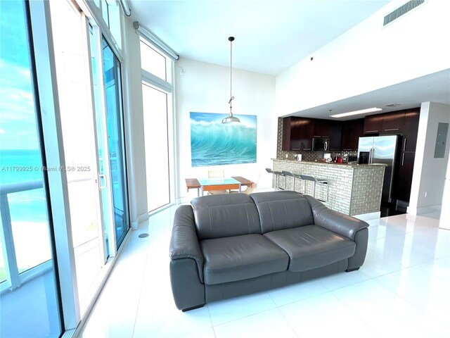 6515 Collins Ave Unit 1801, Miami Beach, FL 33141 - living room with light tile patterned floors