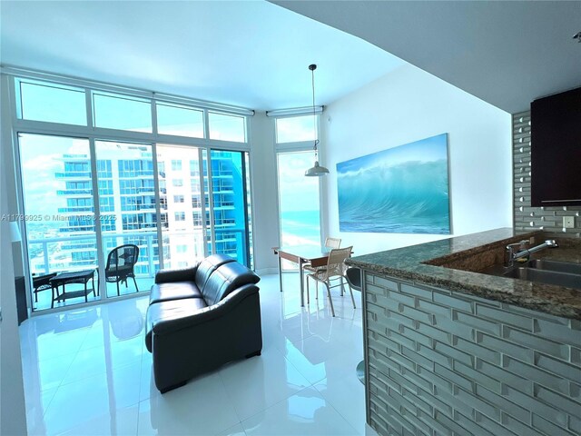 6515 Collins Ave Unit 1801, Miami Beach, FL 33141 - living area featuring tile patterned flooring