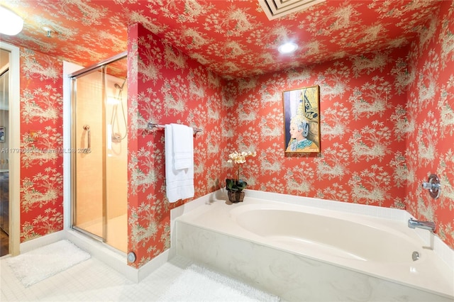 2450 Presidential Way Unit 1607, West Palm Beach, FL 33401 - full bath featuring a stall shower, a garden tub, tile patterned floors, and baseboards