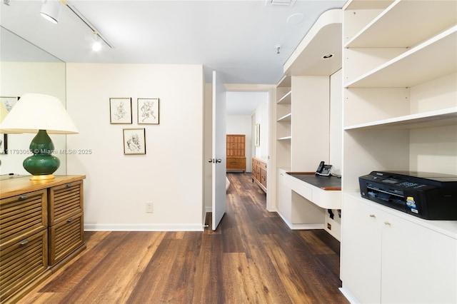 2450 Presidential Way Unit 1607, West Palm Beach, FL 33401 - office with dark wood-style floors, baseboards, and track lighting