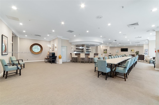 2450 Presidential Way Unit 1607, West Palm Beach, FL 33401 - dining area with light carpet, crown molding, baseboards, and recessed lighting