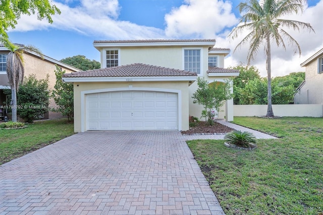 4161 W Silverado Cir, Davie, FL 33024 - mediterranean / spanish house featuring decorative driveway, stucco siding, a front lawn, a tile roof, and a garage