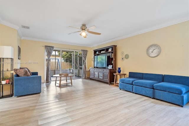 4161 W Silverado Cir, Davie, FL 33024 - living room featuring a ceiling fan, light wood-type flooring, and crown molding