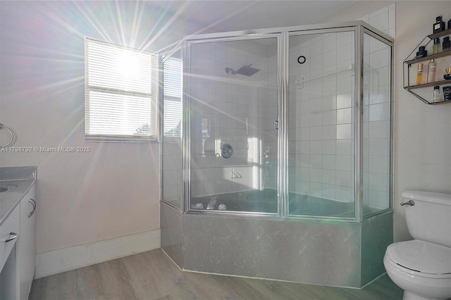 4161 W Silverado Cir, Davie, FL 33024 - full bathroom featuring toilet, bath / shower combo with glass door, vanity, and wood finished floors