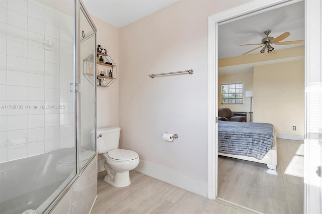 4161 W Silverado Cir, Davie, FL 33024 - ensuite bathroom featuring wood finished floors, toilet, a ceiling fan, baseboards, and a shower with door