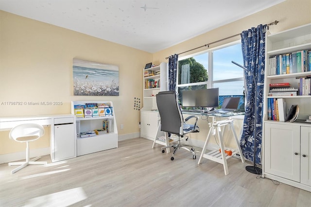 4161 W Silverado Cir, Davie, FL 33024 - office area with light wood-type flooring and baseboards