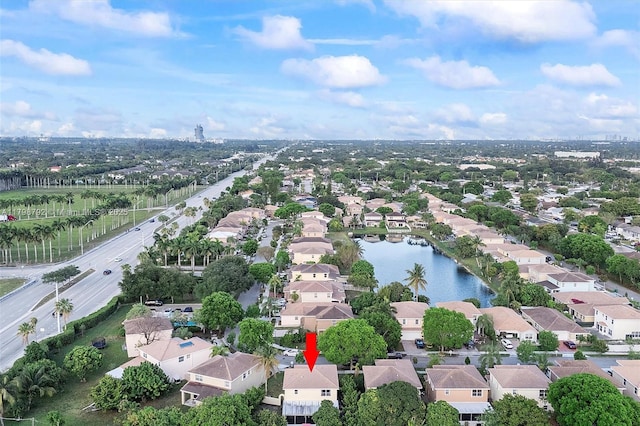 4161 W Silverado Cir, Davie, FL 33024 - aerial view of property and surrounding area featuring nearby suburban area and a nearby body of water