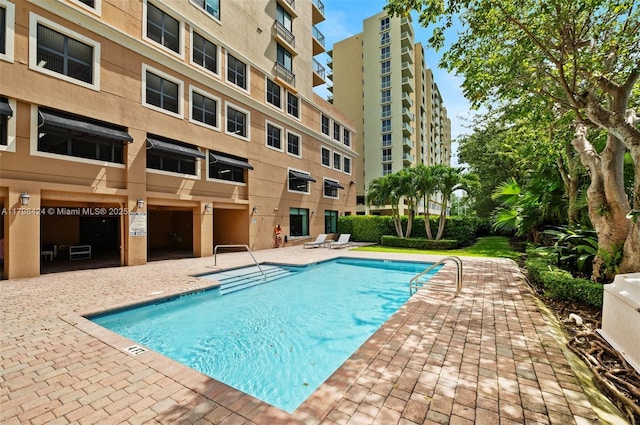 community pool with a patio