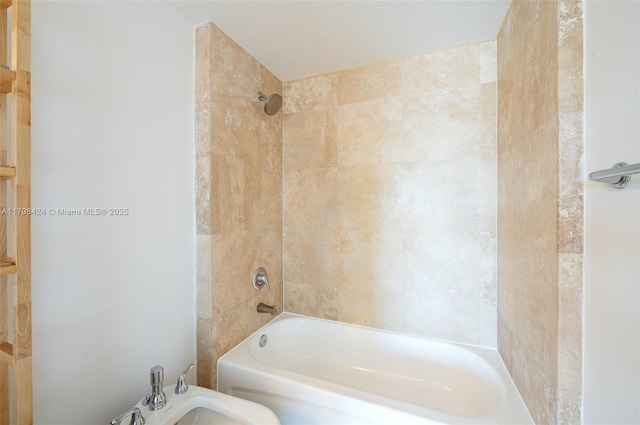 full bath featuring washtub / shower combination and a bidet