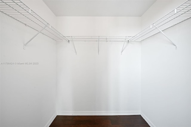 3530 SW 22nd St Unit 614, Miami, FL 33145 - spacious closet featuring wood finished floors