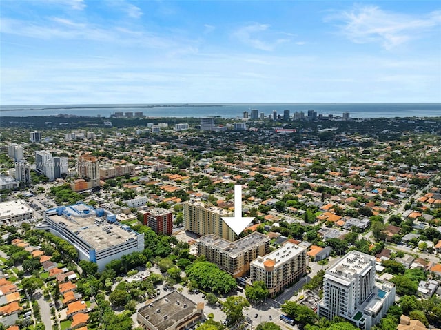 view of urban area featuring a nearby body of water