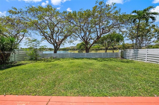 14480 SW 145th Pl, Miami, FL 33186 - view of yard with a water view
