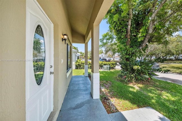 14480 SW 145th Pl, Miami, FL 33186 - view of side of home featuring stucco siding and a lawn