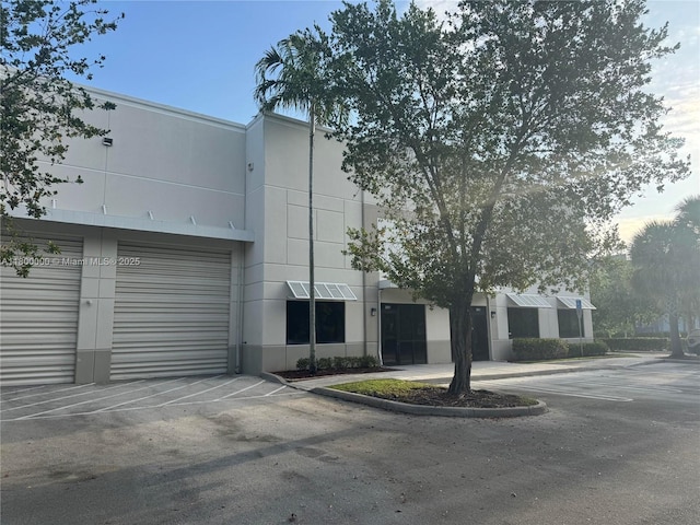 3851 NW 124th Ave, Coral Springs, FL 33065 - view of building exterior with a garage