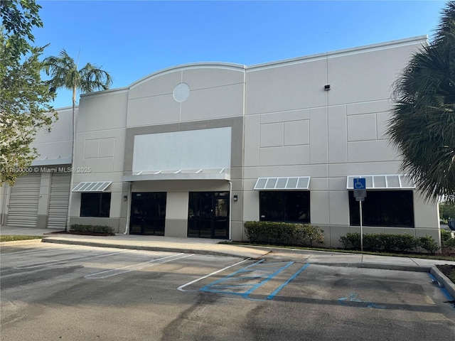 3851 NW 124th Ave, Coral Springs, FL 33065 - view of building exterior featuring uncovered parking