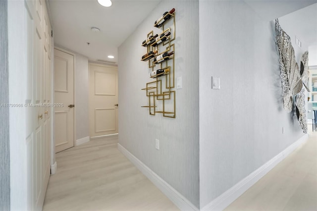 200 Sunny Isles Blvd Unit 2-1503, Sunny Isles Beach, FL 33160 - hallway with light wood-type flooring, baseboards, and recessed lighting
