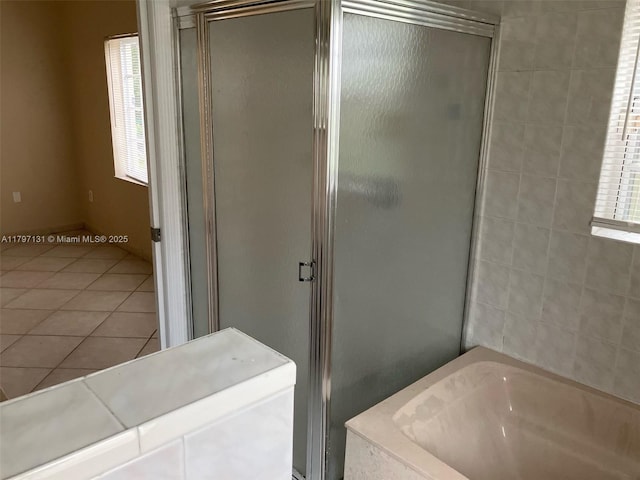 17691 SW 4th Ct, Pembroke Pines, FL 33029 - full bath featuring a stall shower, a bath, and tile patterned floors