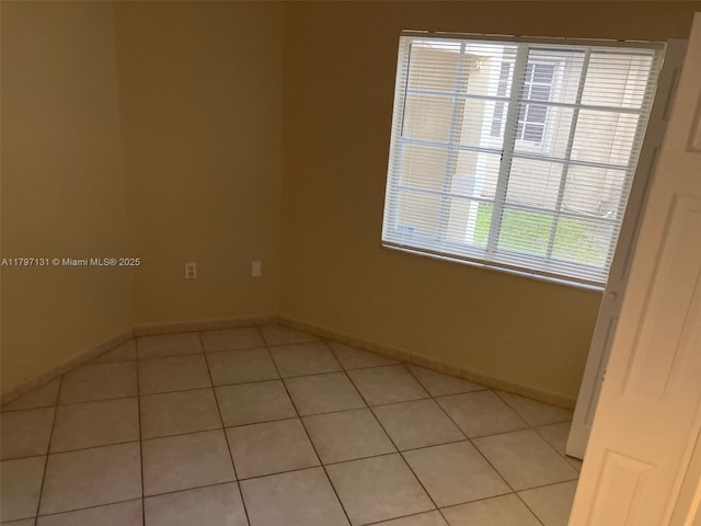 17691 SW 4th Ct, Pembroke Pines, FL 33029 - unfurnished room with baseboards and light tile patterned flooring