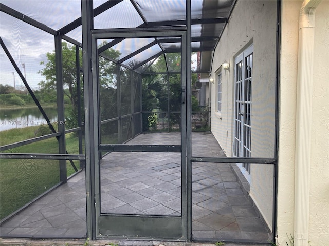 17691 SW 4th Ct, Pembroke Pines, FL 33029 - unfurnished sunroom featuring a water view