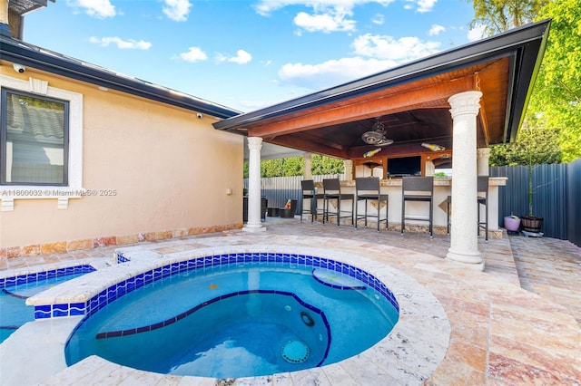 13111 NW 11th Ter, Miami, FL 33182 - view of pool featuring an in-ground hot tub, fence, and a patio