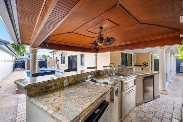 13111 NW 11th Ter, Miami, FL 33182 - view of patio with a fenced backyard, area for grilling, a storage unit, and an outdoor structure