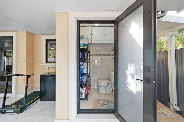 13111 NW 11th Ter, Miami, FL 33182 - bathroom featuring tile patterned floors and toilet