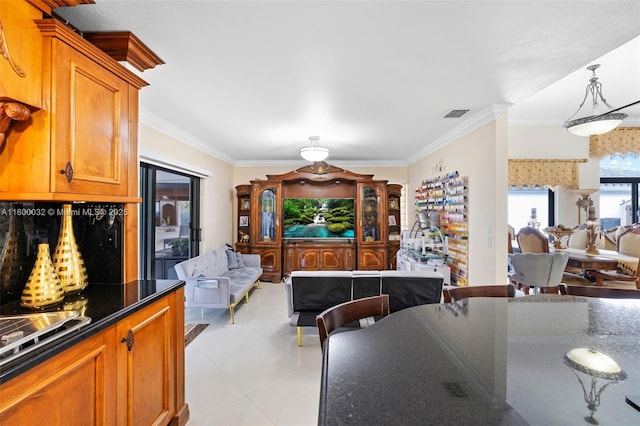 13111 NW 11th Ter, Miami, FL 33182 - dining room with ornamental molding and light tile patterned floors