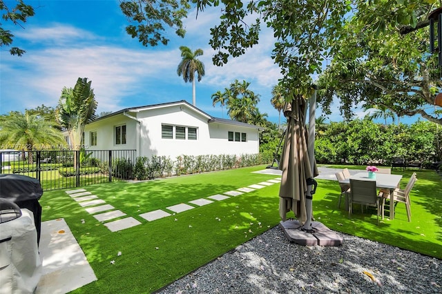 515 NE 115th St, Biscayne Park, FL 33161 - view of yard with outdoor dining space