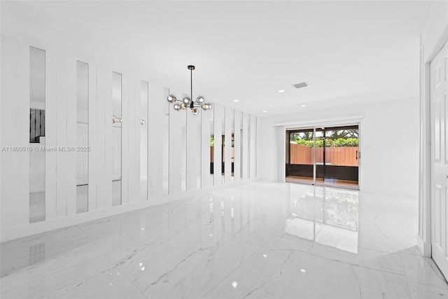 450 SE 7th St Unit 214, Dania Beach, FL 33004 - unfurnished room featuring marble tiled floors, a chandelier, and recessed lighting