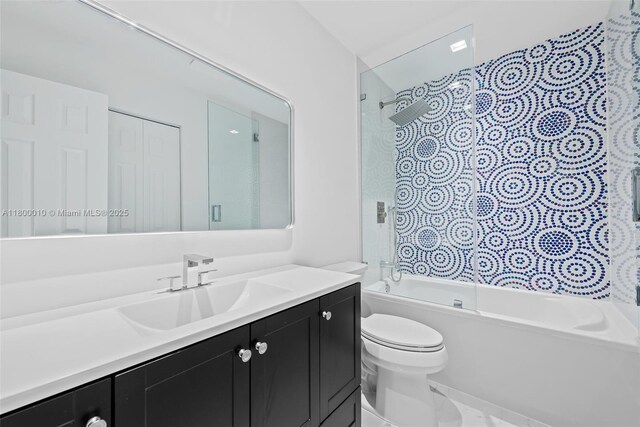 450 SE 7th St Unit 214, Dania Beach, FL 33004 - full bath with toilet, vanity, and bathing tub / shower combination