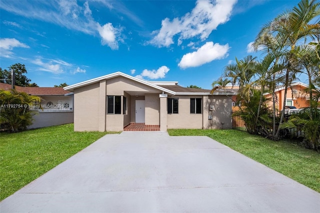 19231 SW 121st Ave, Miami, FL 33177 - rear view of house with stucco siding and driveway