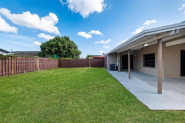19231 SW 121st Ave, Miami, FL 33177 - view of yard featuring central AC unit and a patio