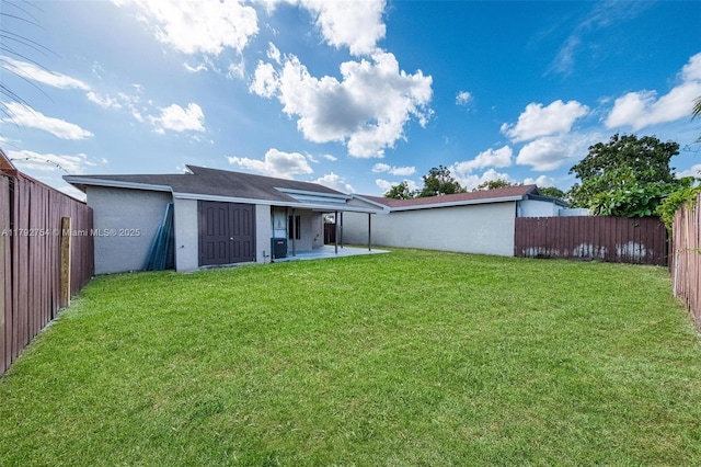19231 SW 121st Ave, Miami, FL 33177 - back of house featuring a patio area, stucco siding, and central AC unit