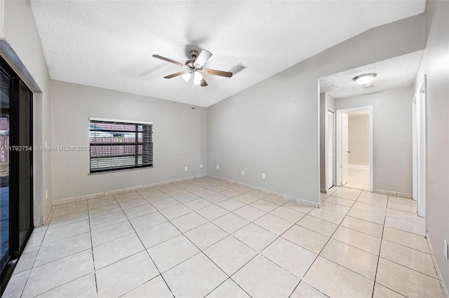 19231 SW 121st Ave, Miami, FL 33177 - unfurnished bedroom featuring a textured ceiling, light tile patterned flooring, a ceiling fan, and baseboards