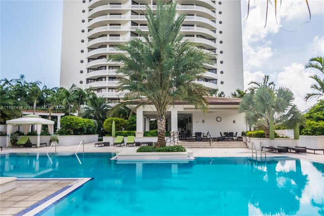 community pool featuring a patio