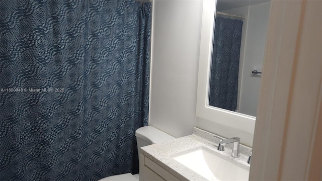 1720 NW N River Dr Unit 113, Miami, FL 33125 - bathroom featuring toilet, vanity, and a shower with curtain